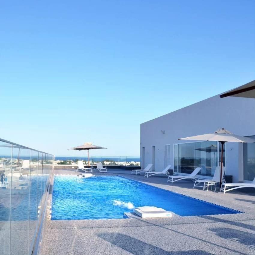 Luxueux appartement meublé bien équipé avec accès piscine et salle de sport Apartment in Mrezga