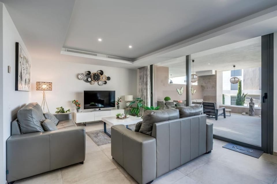 TV and multimedia, Living room, Seating area, furniture, air conditioner, air conditioner