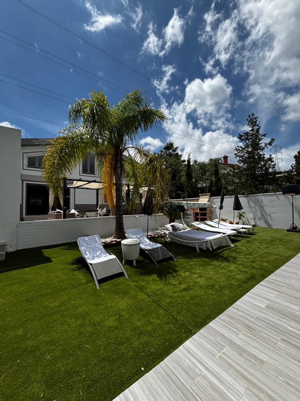 Swimming pool, sunbed