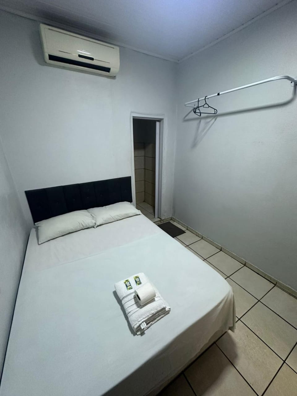 Bed, Photo of the whole room, Bedroom, towels, air conditioner