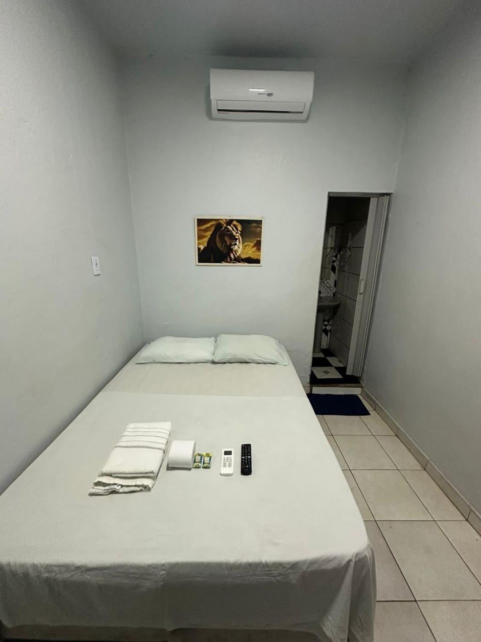 Bed, Photo of the whole room, Bedroom, towels, air conditioner