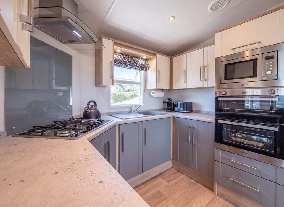 Kitchen or kitchenette, oven, stove, toaster