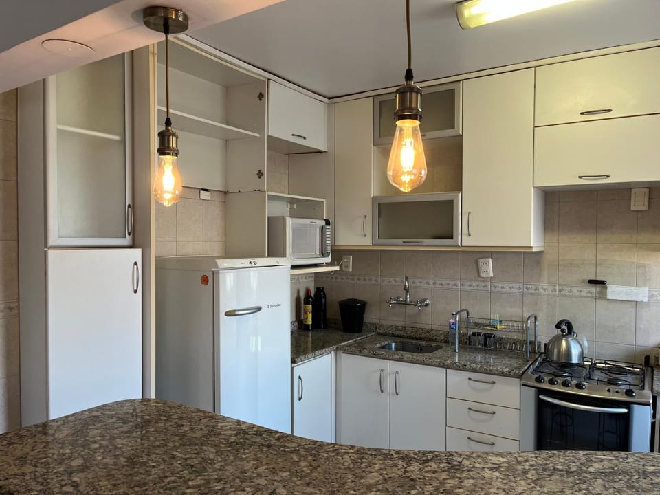 Kitchen or kitchenette, stove