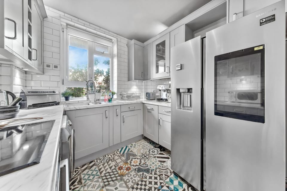 Kitchen or kitchenette, dishwasher, oven, stove, toaster