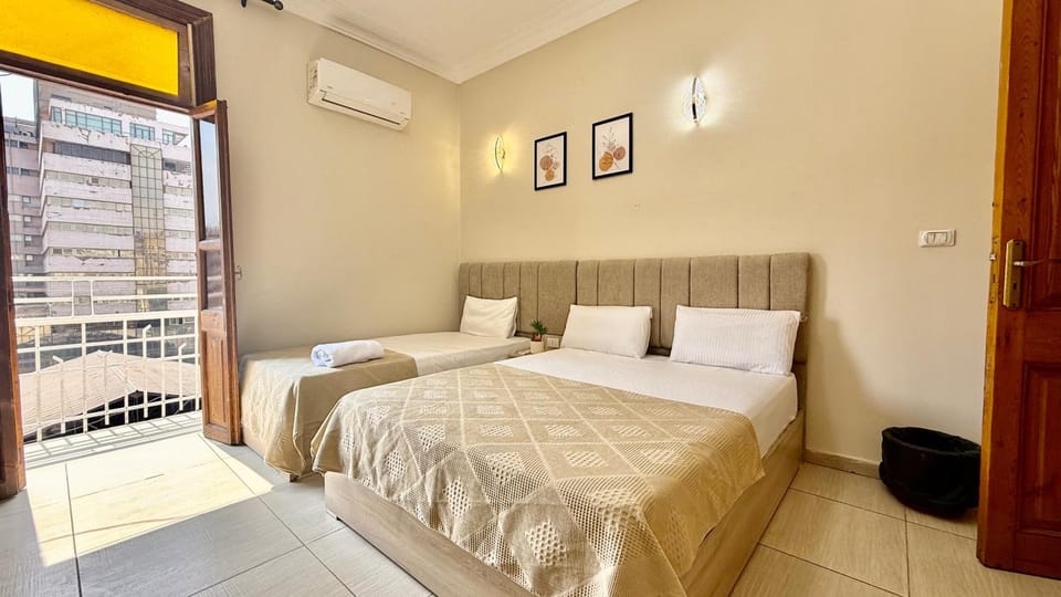 Bed, Photo of the whole room, Bedroom, towels, air conditioner