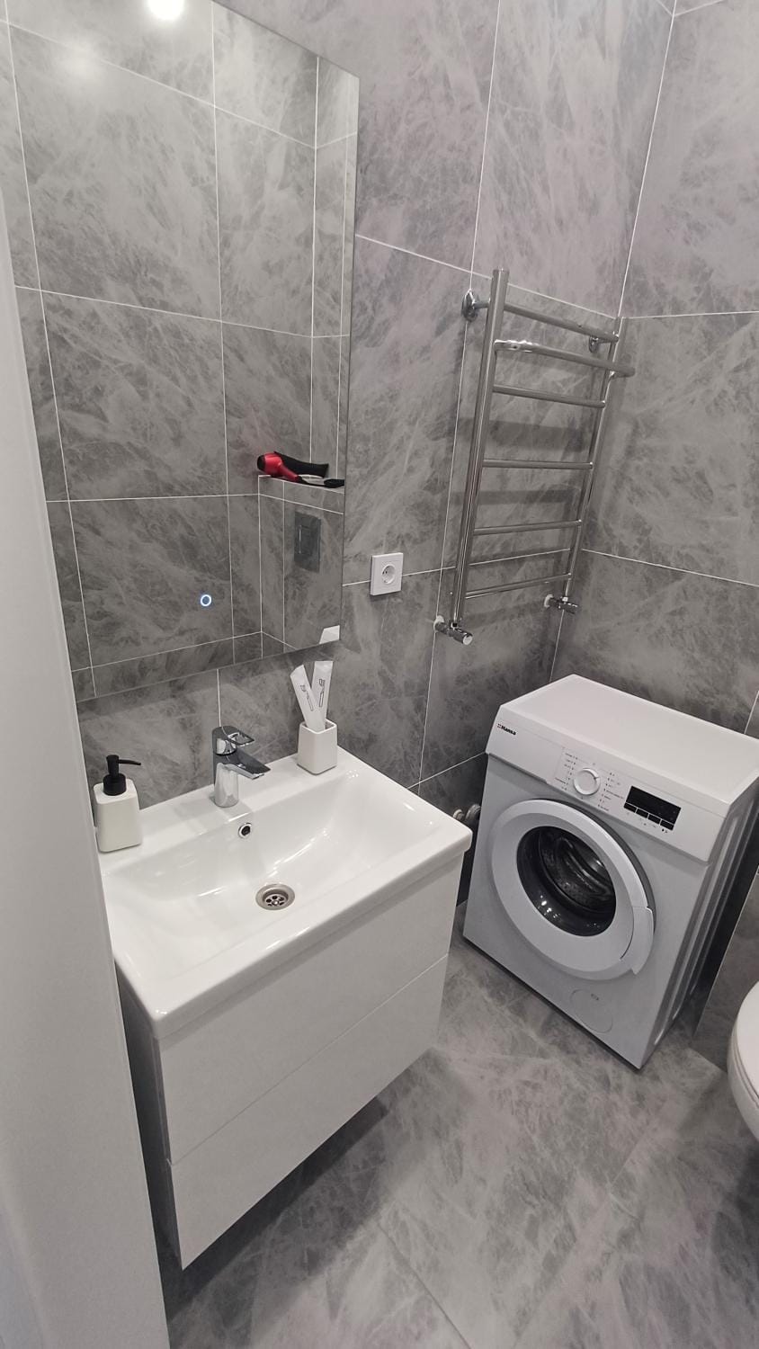 Уютная студия с современным евроремонтом в прекрасном районе Apartment in Almaty