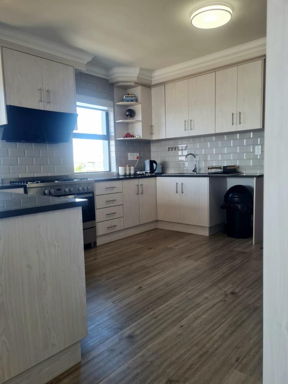 Kitchen or kitchenette, oven, stove, toaster