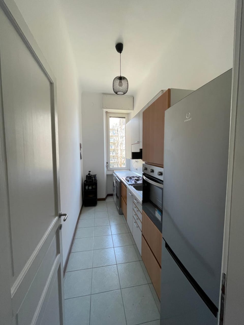 Kitchen or kitchenette, dishwasher, oven, stove, washing machine