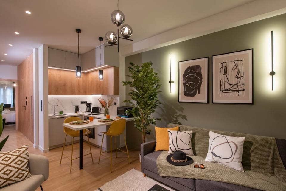 Kitchen or kitchenette, Living room, Seating area, Dining area