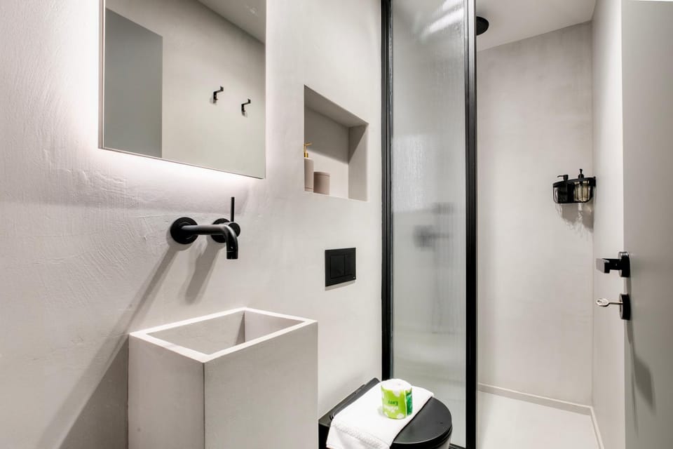 Shower, Toilet, Bathroom, hair dryier, towels