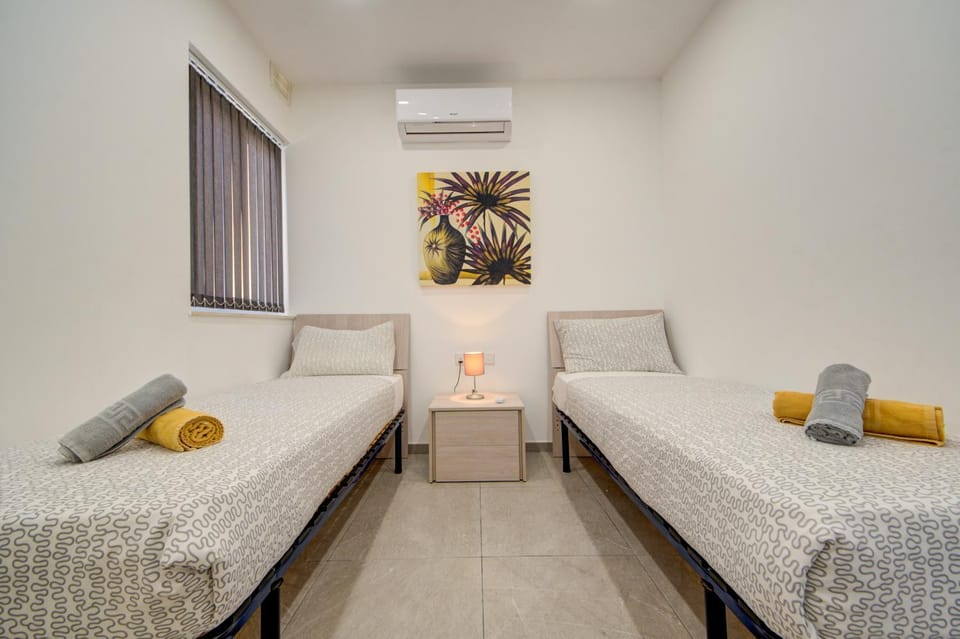 Bed, Photo of the whole room, Bedroom, towels, air conditioner