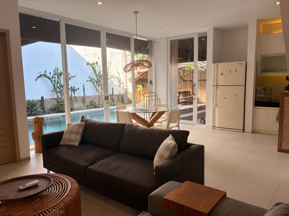 Living room, Dining area, Pool view
