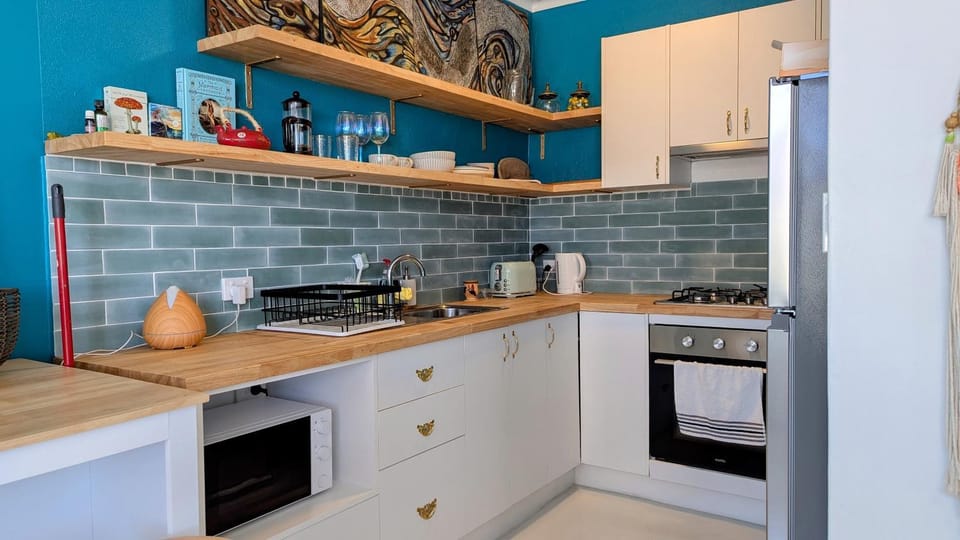 Kitchen or kitchenette, oven, stove