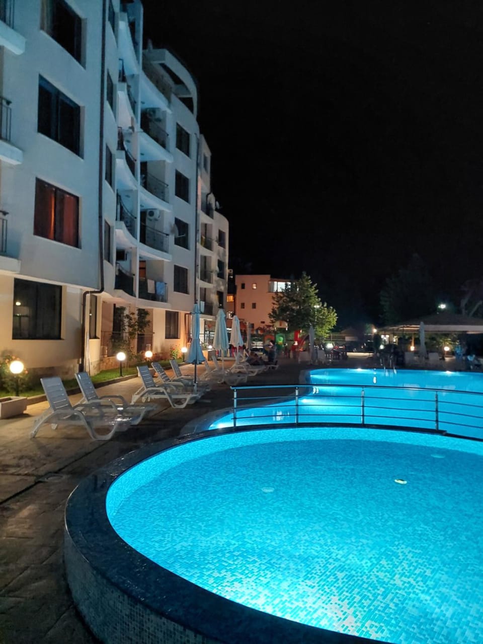 Property building, Night, Pool view, Swimming pool, sunbed