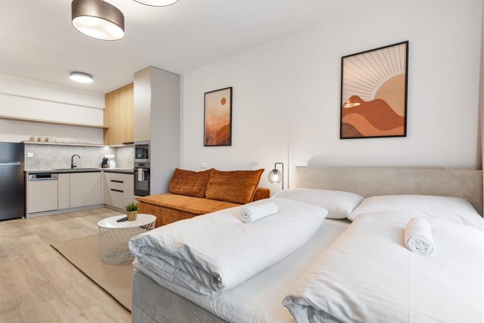 Bed, Kitchen or kitchenette, Living room, Seating area, Bedroom, oven, stove, towels