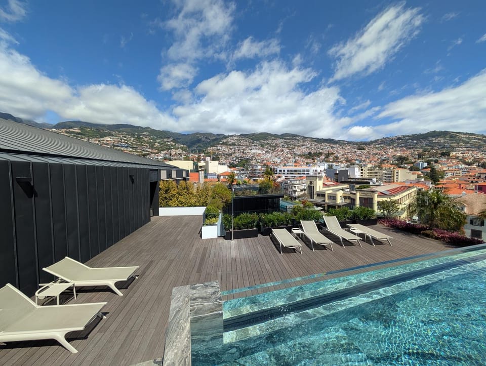 Property building, Day, Natural landscape, Pool view, Swimming pool, sunbed