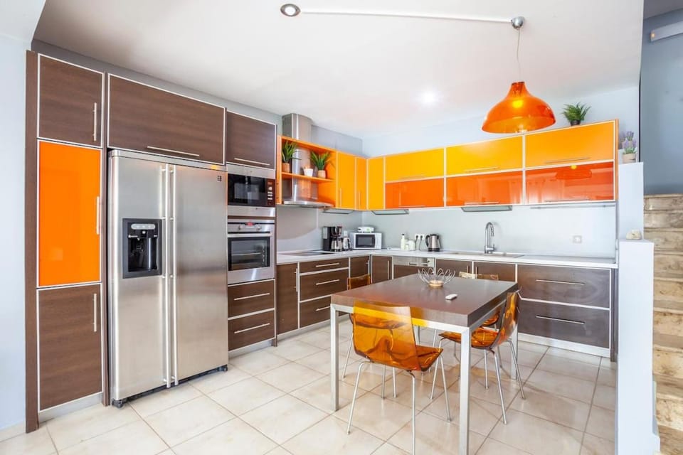 Kitchen or kitchenette, dishwasher, oven, stove, toaster