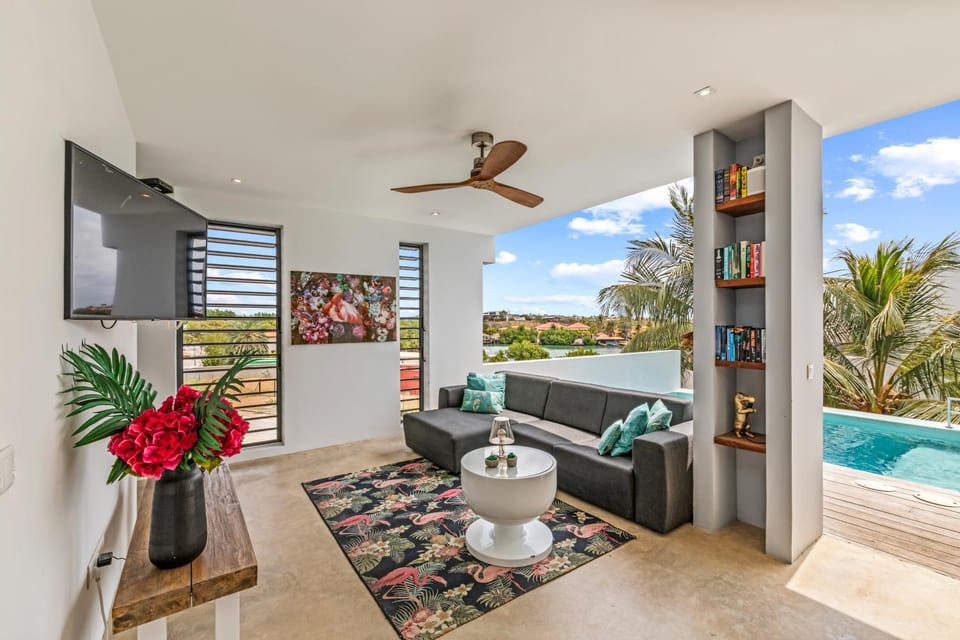 TV and multimedia, View (from property/room), Living room, Seating area, Swimming pool