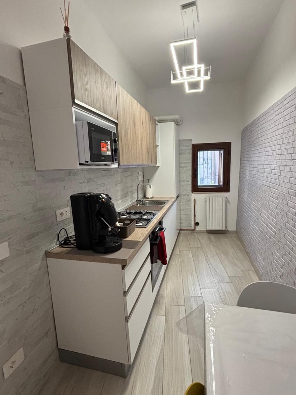 Kitchen or kitchenette, oven, stove