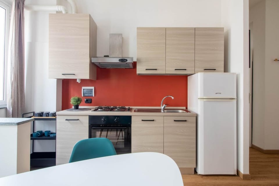 Kitchen or kitchenette, oven, stove