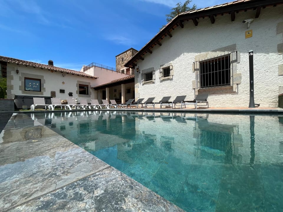 Property building, Living room, Swimming pool
