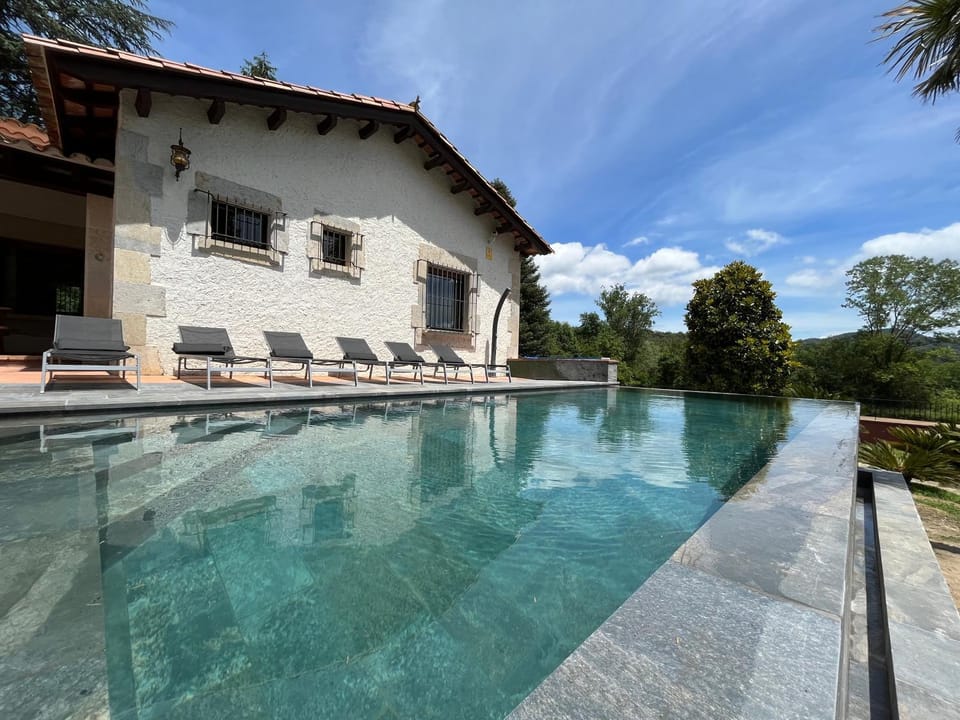 Property building, Living room, Swimming pool
