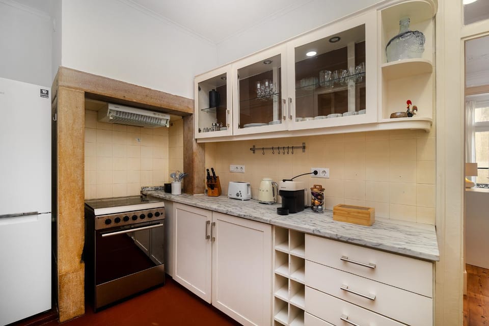Kitchen or kitchenette, dishwasher, oven, stove, toaster