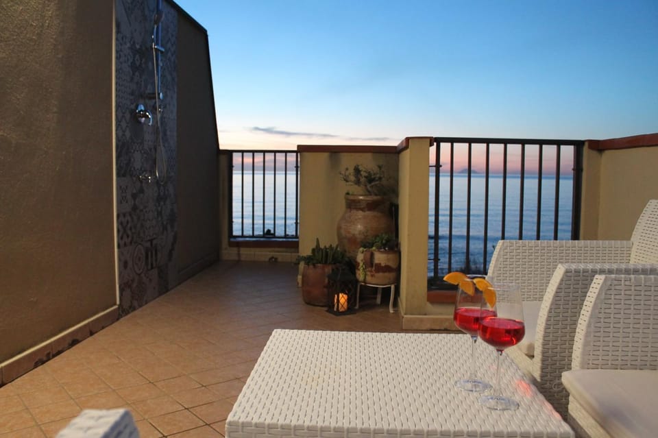 Shower, Sea view, Sunset