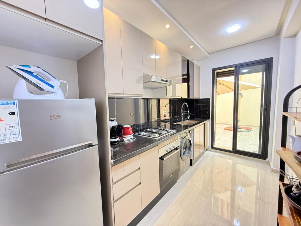 Kitchen or kitchenette, oven
