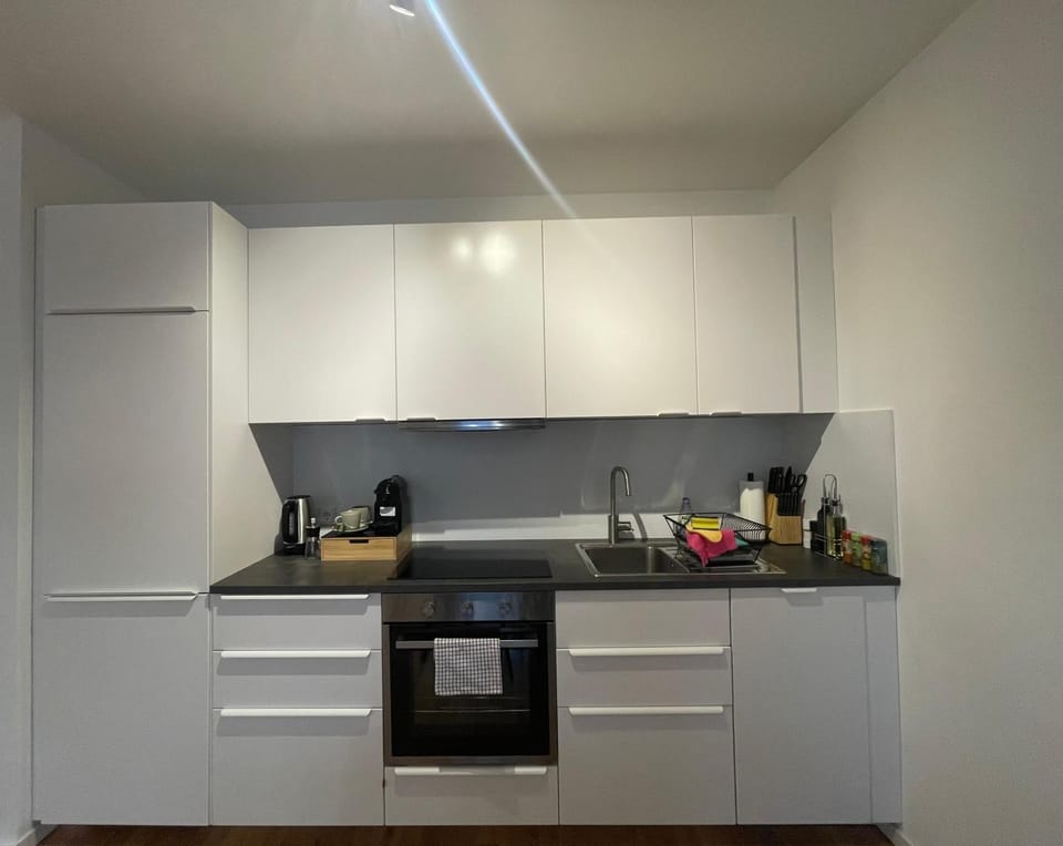 Kitchen or kitchenette, stove, toaster