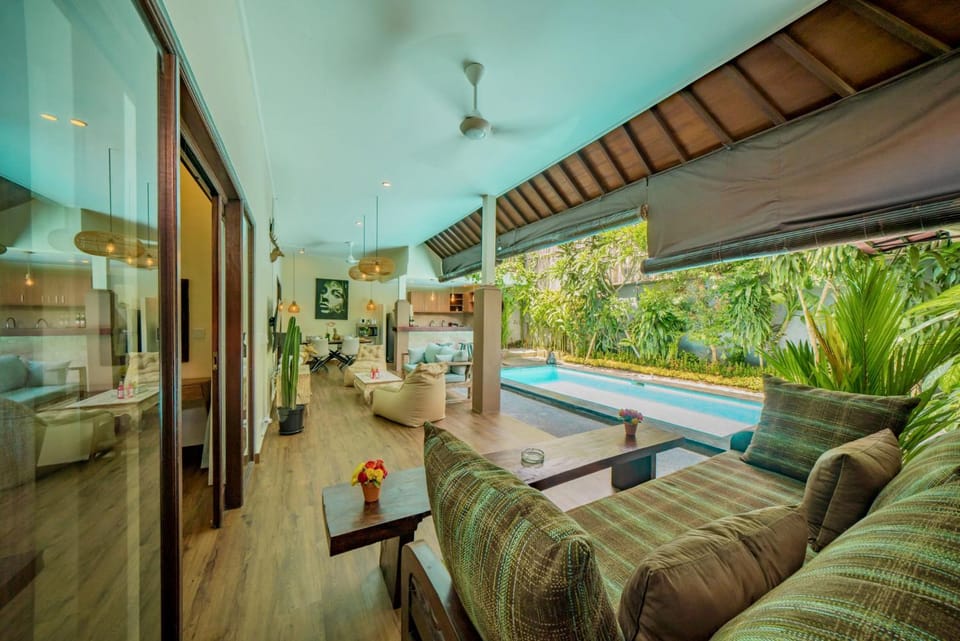 Patio, Living room, Seating area, Evening entertainment, Pool view
