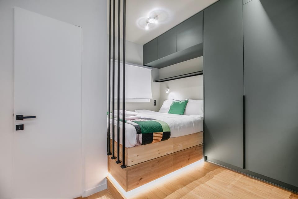 Bed, towels, wardrobe, air conditioner
