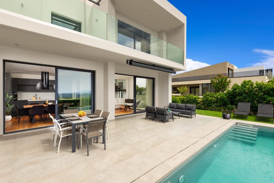 Property building, Patio, Garden, Seating area, Swimming pool, sunbed