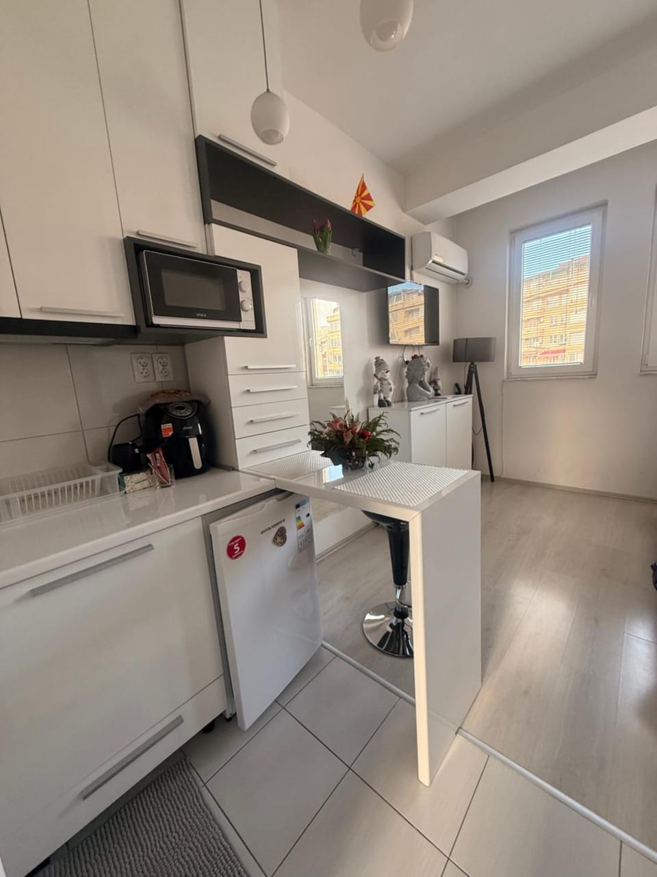 Kitchen or kitchenette, dishwasher, oven, stove