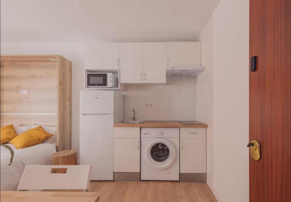 Kitchen or kitchenette, washing machine
