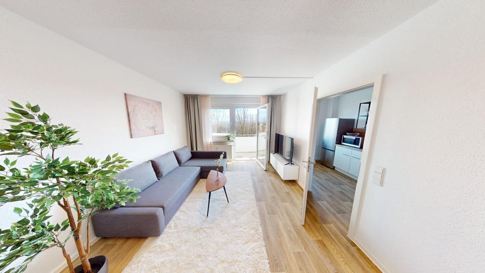 Bed, TV and multimedia, Living room, Seating area