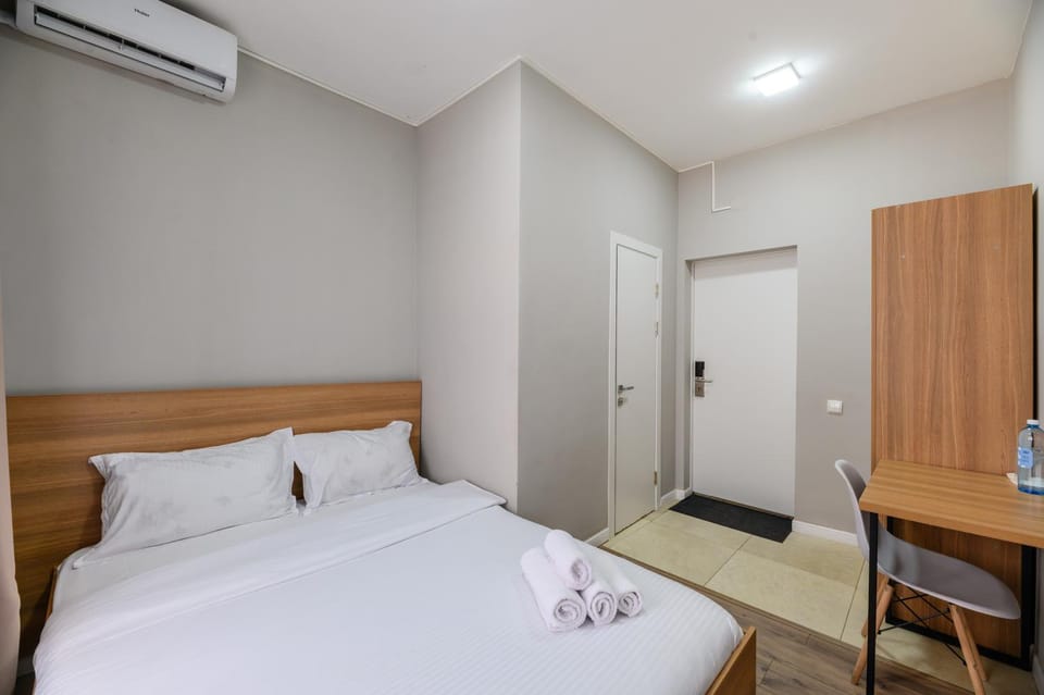 Bed, Photo of the whole room, Bedroom, towels, air conditioner