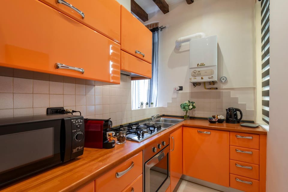 Kitchen or kitchenette, stove
