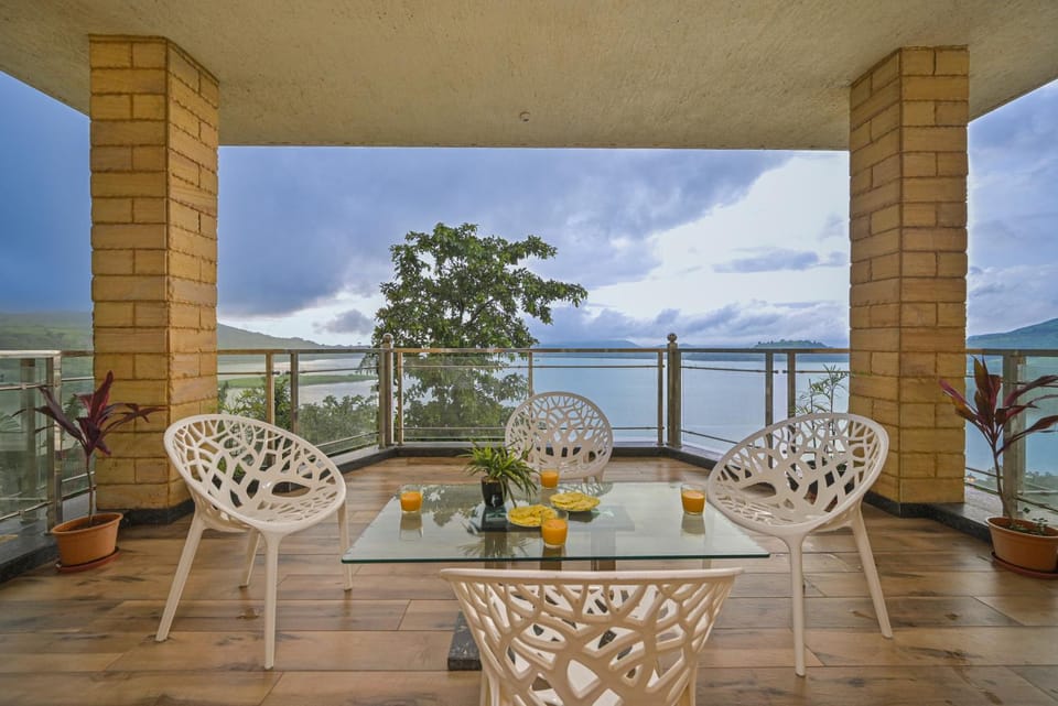 Patio, Day, Natural landscape, View (from property/room), Balcony/Terrace, Living room, Seating area, Lake view, Sea view