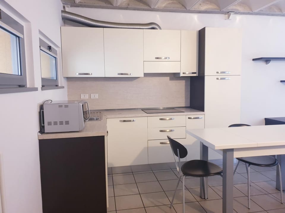 Kitchen or kitchenette, oven, stove