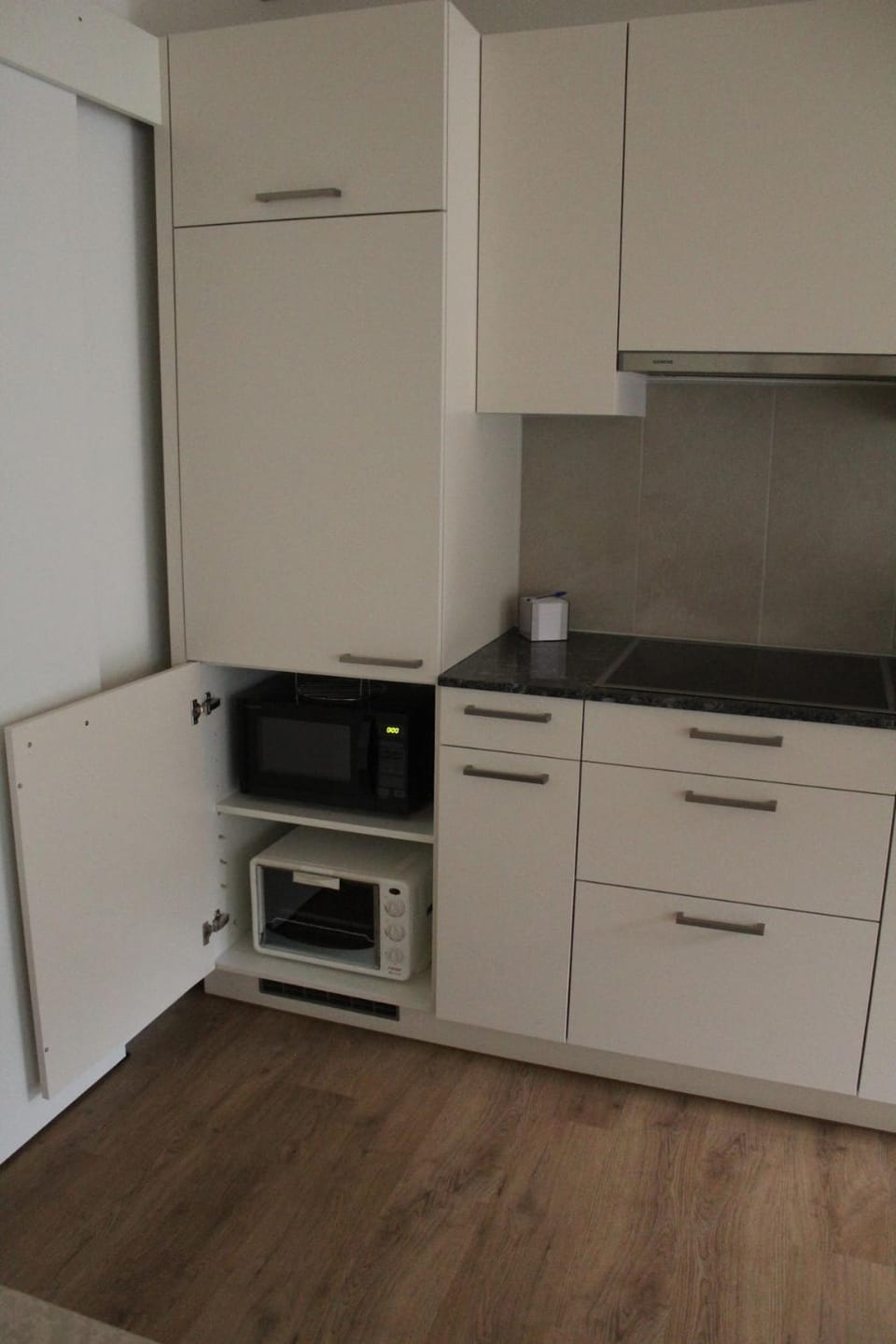 Kitchen or kitchenette, microwave