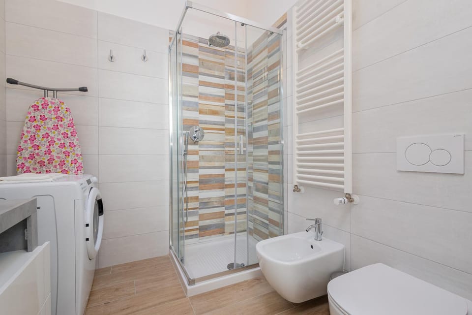 Shower, Toilet, Bathroom, bidet, towels, washing machine, washing machine, dryer