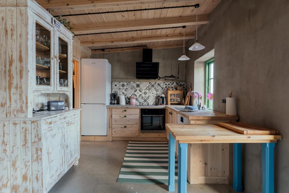 Kitchen or kitchenette, dishwasher, oven, stove