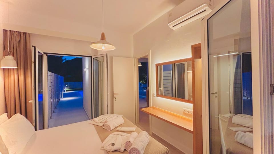 Bed, Photo of the whole room, Bedroom, towels, air conditioner