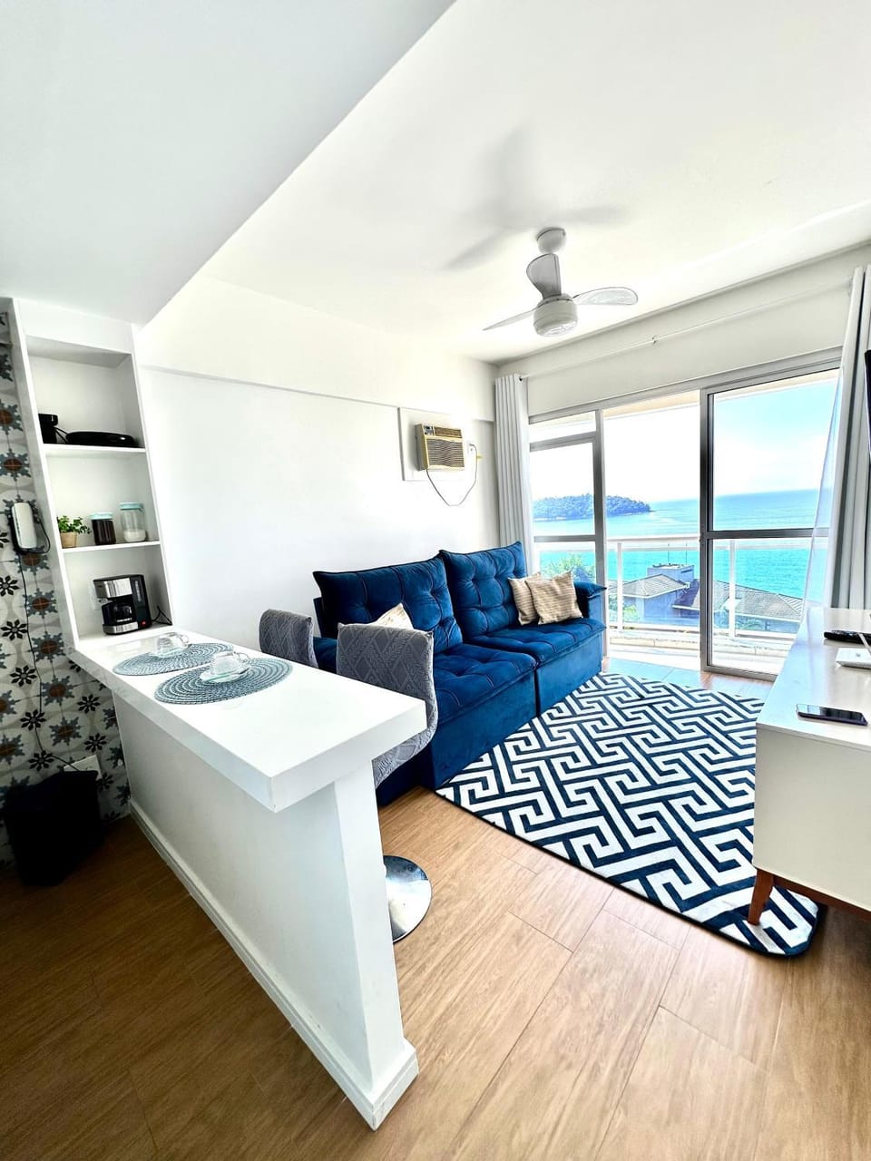 Natural landscape, Living room, Seating area, Sea view, air conditioner