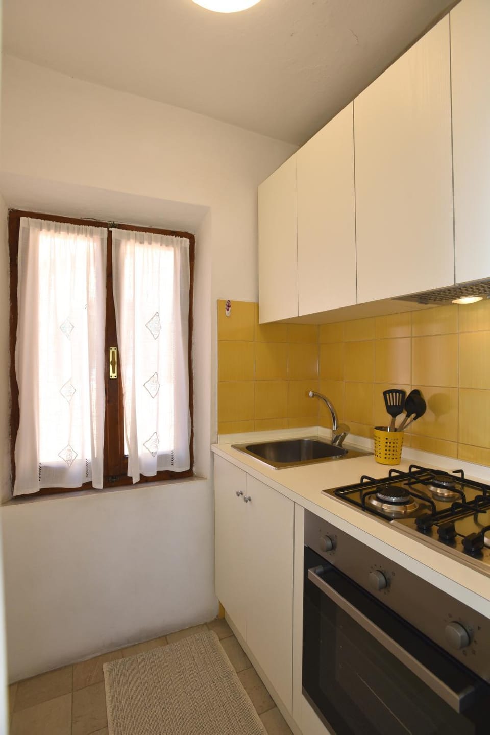 Kitchen or kitchenette, stove