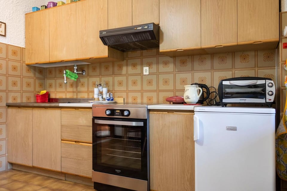 Kitchen or kitchenette, oven, stove, toaster