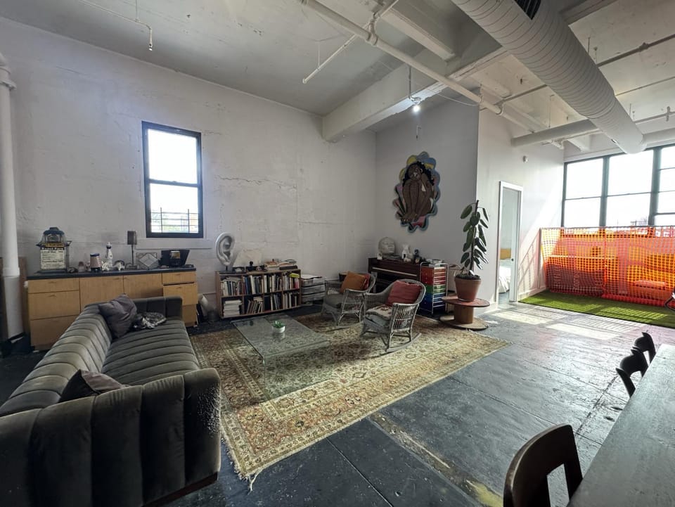 Bed, Living room, Seating area, Bedroom