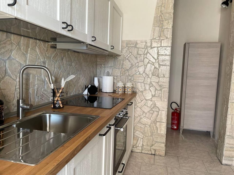 Kitchen or kitchenette, stove