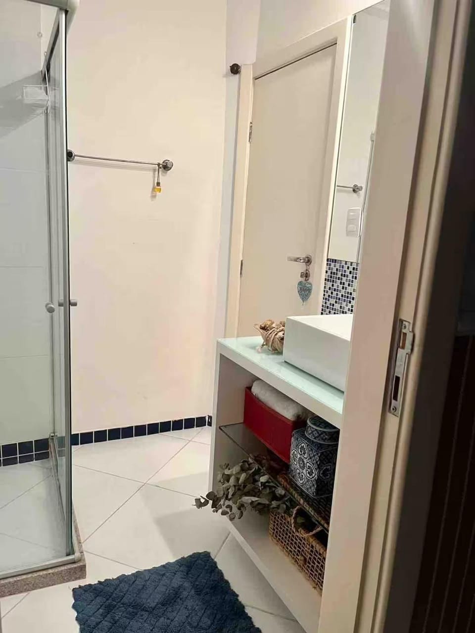 Shower, Bathroom, Decorative detail, hair dryier, towels